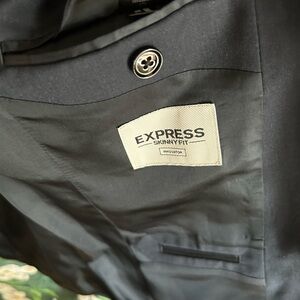 Express blazer men navy blue wool skinny fit was worn few times for a short time